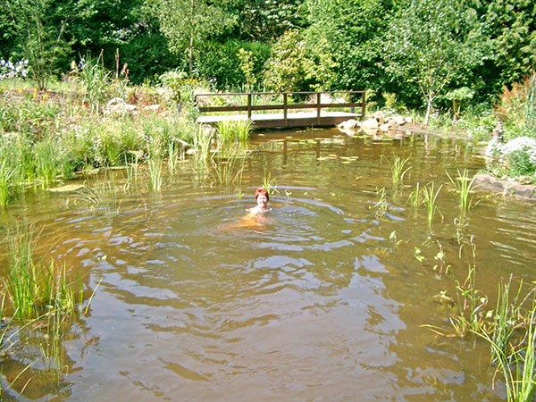 Swimming Pond with lady customer enjoying a dip