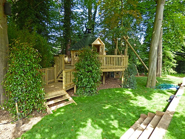 Raised decking play area featuring Barbecue Lodge and Zip Wire
